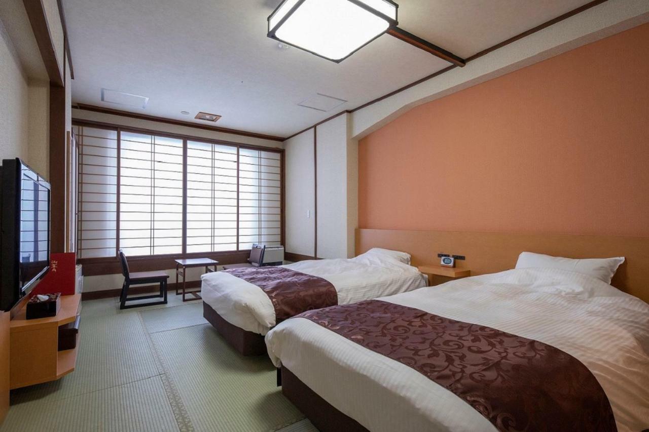 Hotel Apple Land Hirakawa Exteriör bild